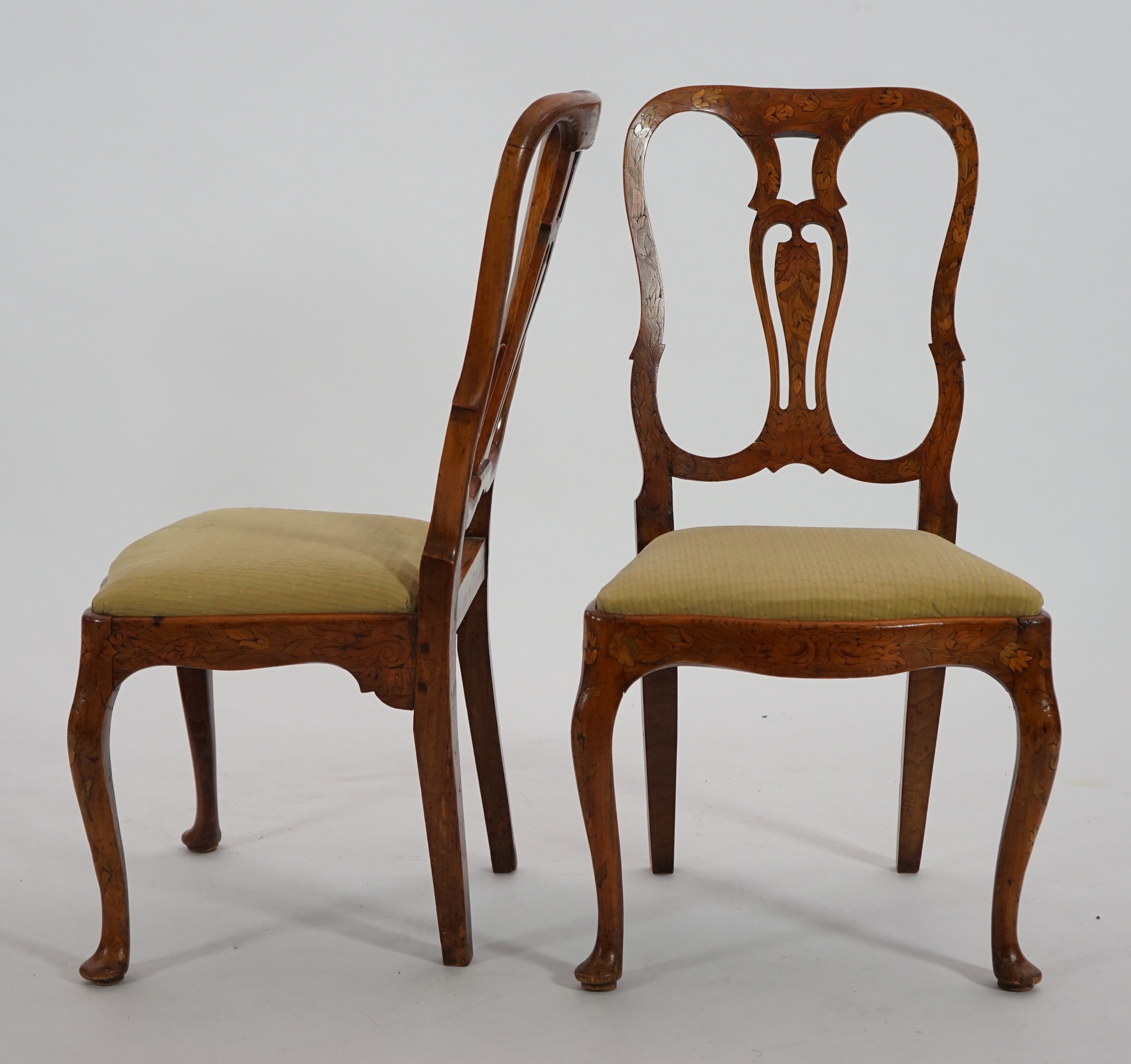 A set of six 18th century Dutch walnut and marquetry dining chairs